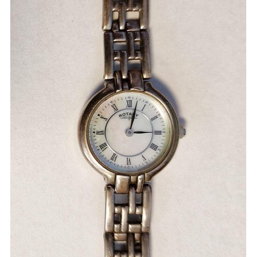 434 - Rotary silver-cased lady's wristwatch, with mother-of-pearl dial, Roman numerals, on a silver link b... 