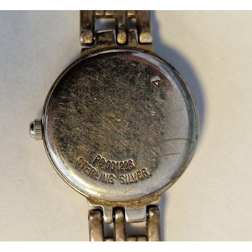 434 - Rotary silver-cased lady's wristwatch, with mother-of-pearl dial, Roman numerals, on a silver link b... 