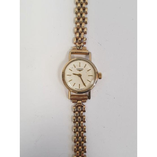 444 - Lady's Longines wristwatch with gold coloured case, baton numerals and side button and the 9ct gold ... 