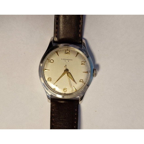 454 - Gentleman’s 1950’s Longines stainless steel wristwatch with Arabic and baton numerals, side button a... 