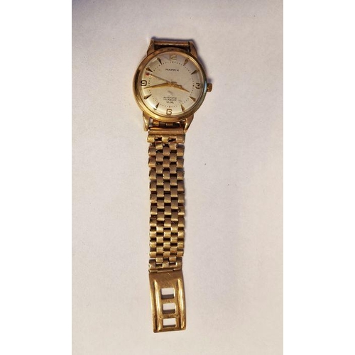 456 - 9ct gold gentleman's wristwatch with silver dial and baton hour markers, second sweep hand, marked '... 