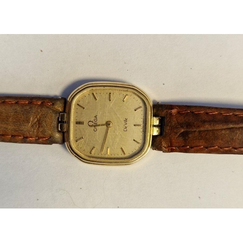 461 - Lady's rolled gold-cased Omega wristwatch, the champagne square dial with hour batons, on a leather ... 