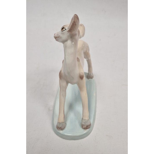 50 - Wedgwood & Co early 20th century handpainted pottery fawn, on pale blue oval base, 15.5cm high