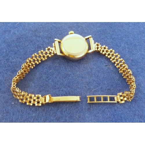 444 - Lady's Longines wristwatch with gold coloured case, baton numerals and side button and the 9ct gold ... 