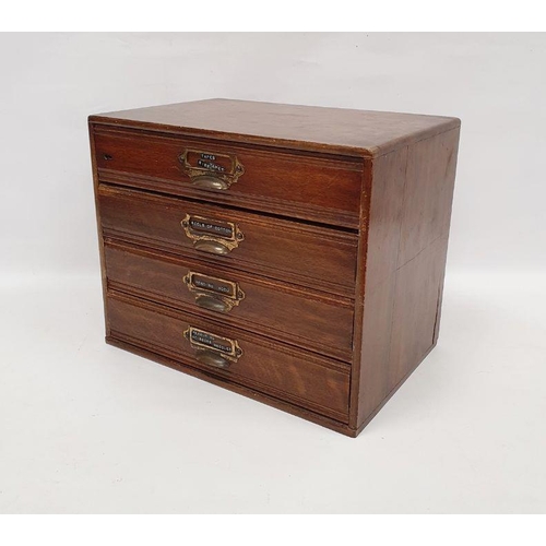 121 - Oak table-top nest of four drawers containing assorted sewing items, to include ribbons, reels of co... 