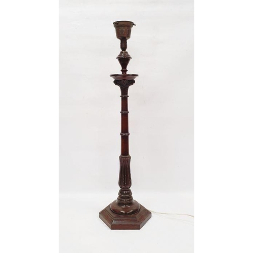 125 - Carved wooden table lamp in the form of a pillar with acanthus leaf design, on a six-sided stepped b... 