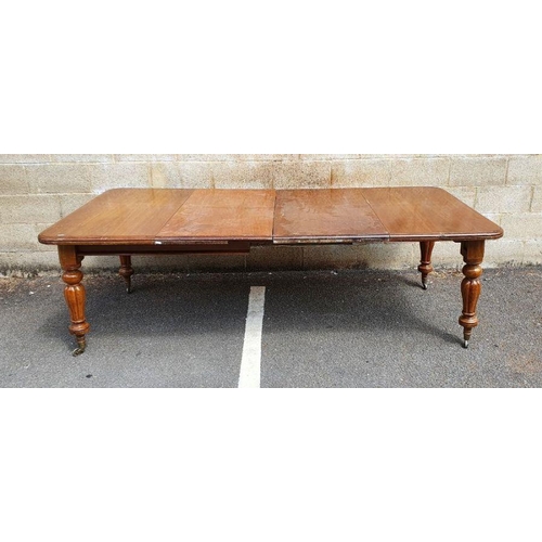 1282 - Victorian mahogany extending dining table, the rectangular top with rounded front corners, two exten... 