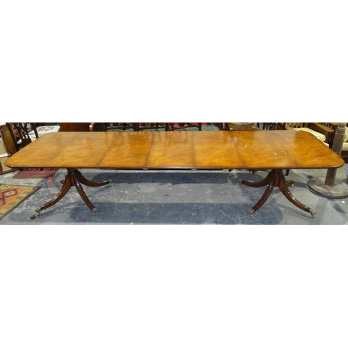 1301 - Good quality reproduction Regency mahogany extending dining table by Barry Cotton with three leaves,... 