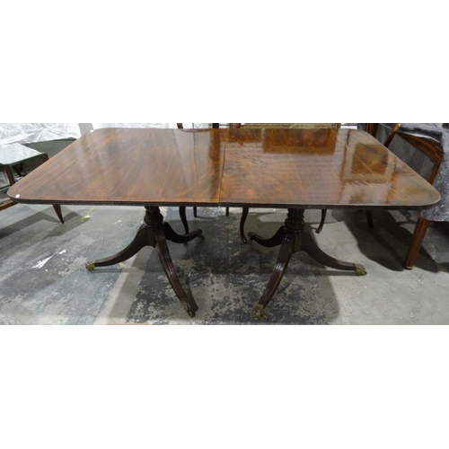 1325 - Reproduction Regency mahogany twin-pedestal dining table, the rectangular top with rounded corners a... 