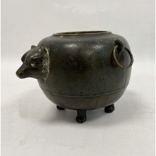 137 - Japanese bronze 'Magic Tea Kettle' pot, ovoid, with a badger's head on one side and the tail on the ... 