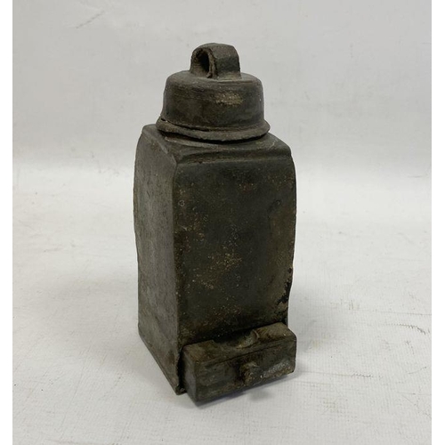 138 - An unusual lead object, with a screw lid and handle and a small drawer below, 14cm high, 5.5cm deep ... 