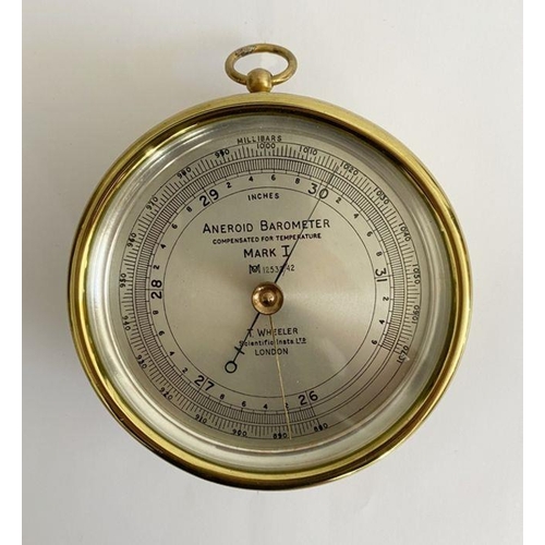 244 - Edwardian gilt brass mounted aneroid barometer by T Wheeler (London), the silvered dial named MARK I... 