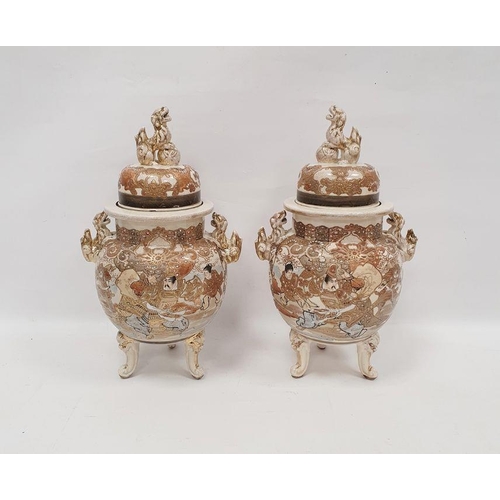 32 - Pair of Japanese Satsuma vases and domed covers, early 20th century, painted in gilt with flowers wi... 