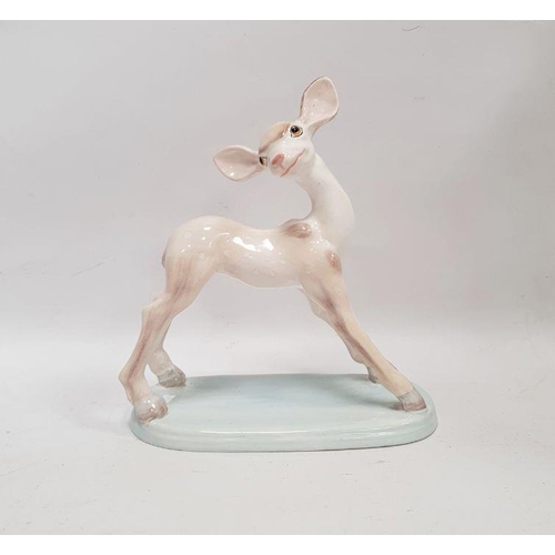 33 - Wedgwood & Co mid- 20th century handpainted pottery fawn, on pale blue oval base, 15.5cm high