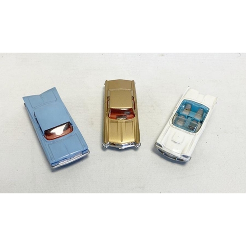 538 - Three loose Corgi Toys diecast model cars to include No.245 Buick Riviera, No. 220 Chevrolet Impala ... 