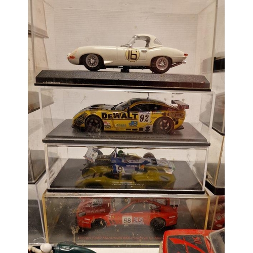 559 - Collection of cased and cased  plastic and diecast model cars and slot cars to include Ixo Ferrari 1... 