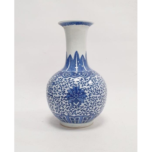 61 - Contemporary Chinese bottle vase with underglaze blue decoration of lotus flowers on a scrolling fol... 