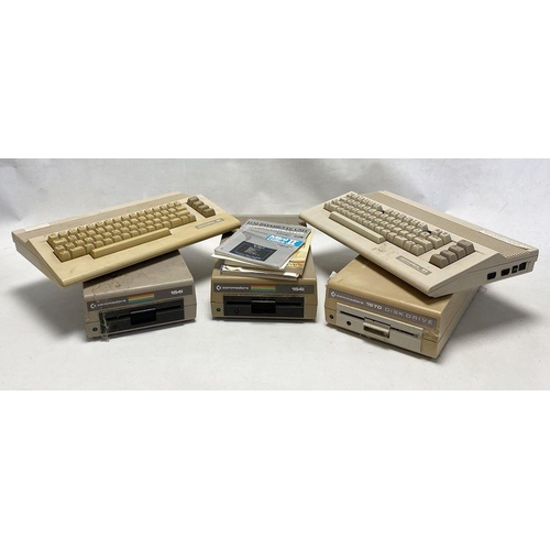 619 - Two Commodore 64 personal computers and Three Commodore Disk Drives to include Commodore 1570 Disk D... 