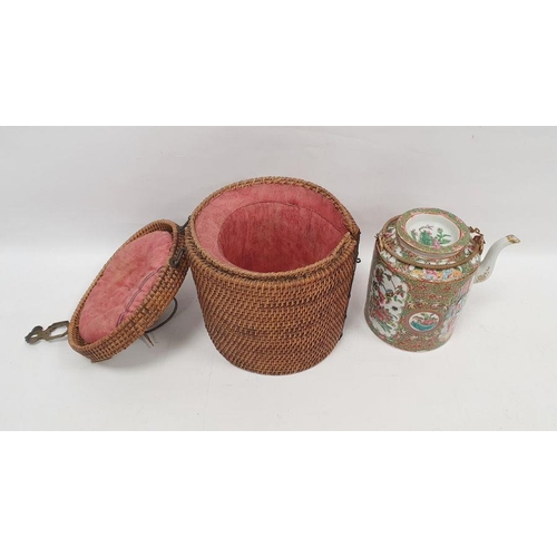 68 - Cantonese porcelain cylindrical teapot and cover in a wicker basket, painted in the famille rose pal... 