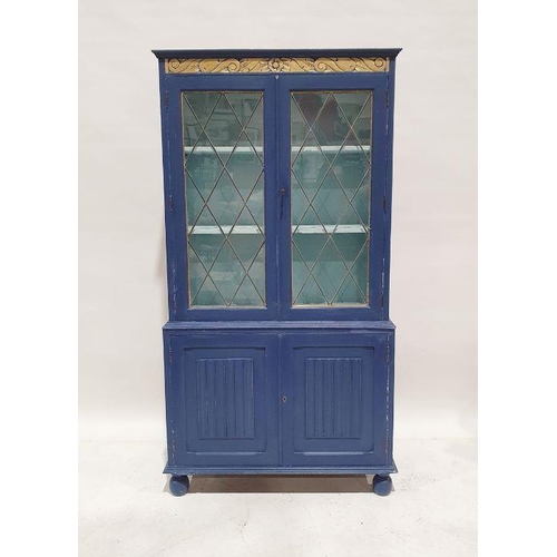 1073 - 20th century painted cabinet, the leaded glazed doors enclosing shelves above two linenfold cupboard... 