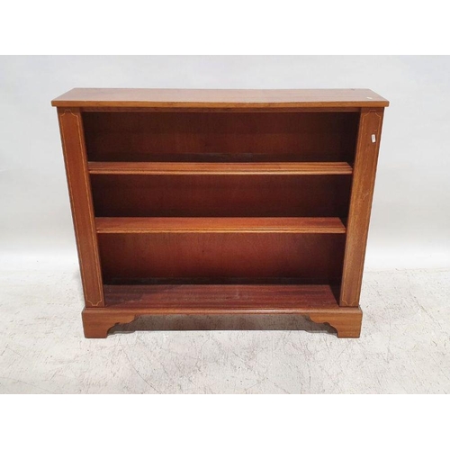 1079 - 20th century mahogany and strung open bookcase, the rectangular top above three shelves, on bracket ... 