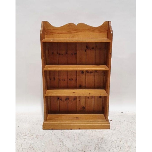 1081 - Modern pine open bookcase with three-quarter galleried back above the four shelves, on plinth base, ... 