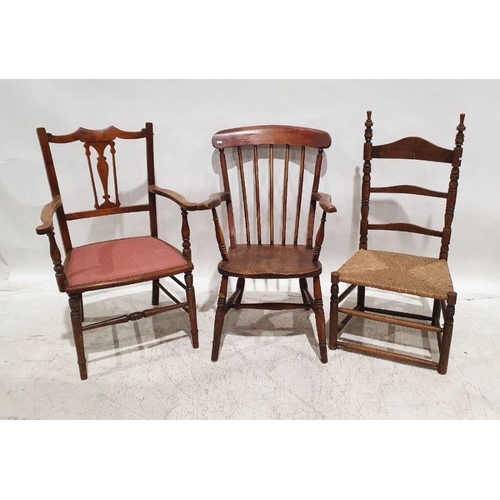 1094 - Elm-seated stickback carver chair on turned supports, stretchered base and two further chairs (3)