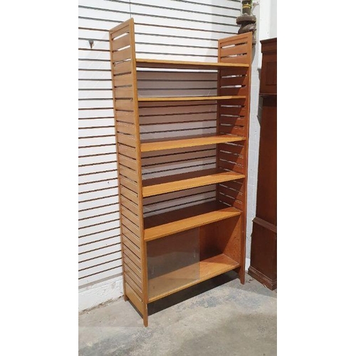 1111 - Mid-century modern teak Ladderax-style shelving system with four shelves and unit with sliding glass... 