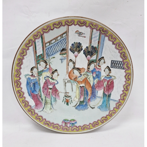 70 - Late 19th century Chinese porcelain charger, painted in the famille rose palette with figures of att... 