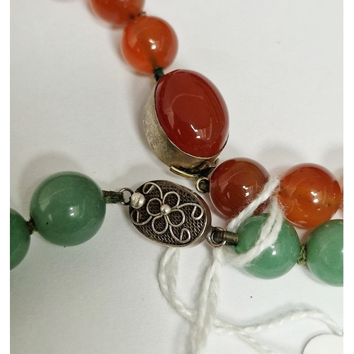 358 - Green hardstone bead necklace, graduated with silver clasp and a cornelian bead necklace (2)