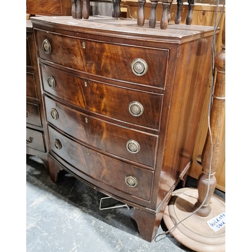 1234 - 20th century mahogany bowfront chest of four long drawers, on bracket feet and a nest of three oak c... 