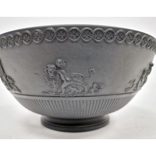 10 - Black basalt bowl in the manner of Wedgwood with decorated rim, the body with applied moulded scenes... 