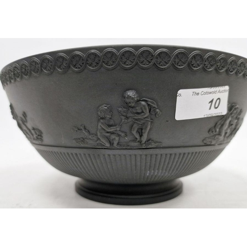 10 - Black basalt bowl in the manner of Wedgwood with decorated rim, the body with applied moulded scenes... 