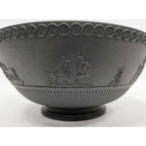 10 - Black basalt bowl in the manner of Wedgwood with decorated rim, the body with applied moulded scenes... 