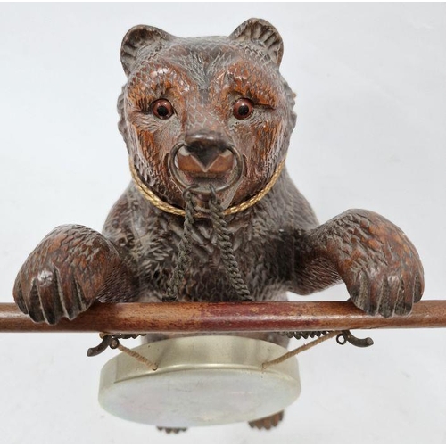 110 - Black forest carved bear as a dinner gong, 31 cm high