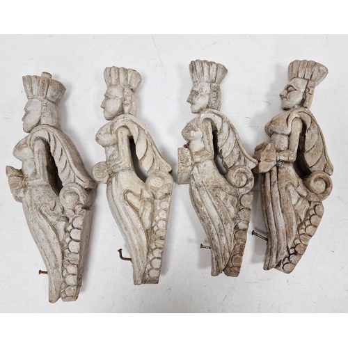 120 - Set of four possibly 19th century carved wooden corbels of female form