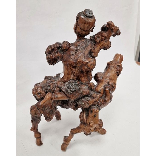 131 - Japanese root carving of a figure on horseback