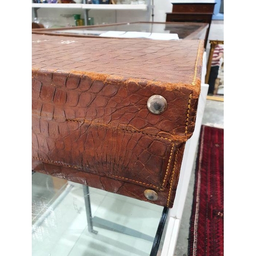 136 - Crocodile skin suitcase, early to mid 20th century, gilt lettering stamped for John Bagshaw & Sons, ... 