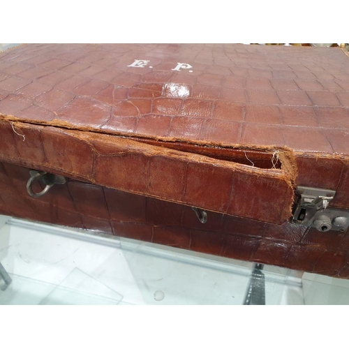 136 - Crocodile skin suitcase, early to mid 20th century, gilt lettering stamped for John Bagshaw & Sons, ... 