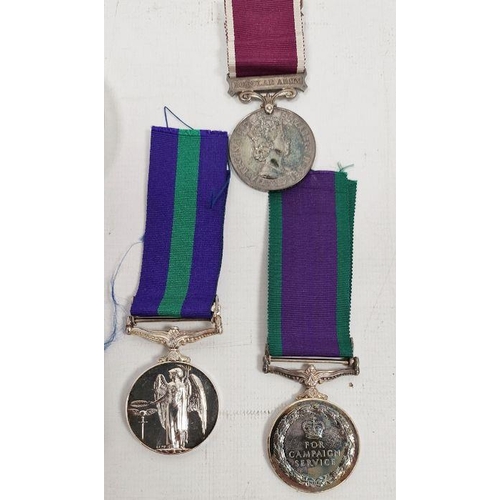 155 - Regular service long service medal, a campaign service medal, a 1954-55 Egypt cloth badge, a compass... 