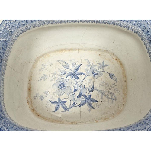 22 - Large blue and white footbath with floral decoration, indistinctly marked to base, 21cm x 47cm x 32c... 