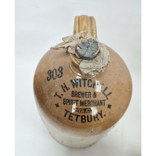 24 - Stoneware bottles and jugs to include one marked 'T H Witchell Brewer & Spirit Merchant, Tetbury', a... 