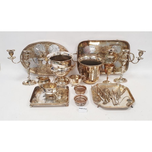 280 - Various silver-plate to include a two-handled urn, teaset, candlesticks, trays, butter dishes, etc (... 