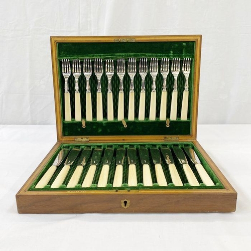 287 - A cased canteen of plated fish eaters with ivory type handles