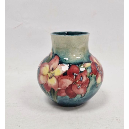 34 - Moorcroft vase, the ovoid body with floral decoration, initialled WM in blue to base, 12cm high