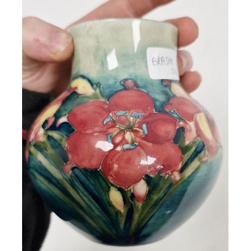 34 - Moorcroft vase, the ovoid body with floral decoration, initialled WM in blue to base, 12cm high