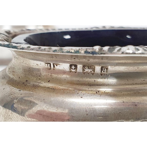 342 - Pair Victorian silver salts, oval with gadrooned everted rim, blue glass liners, initialled, Birming... 