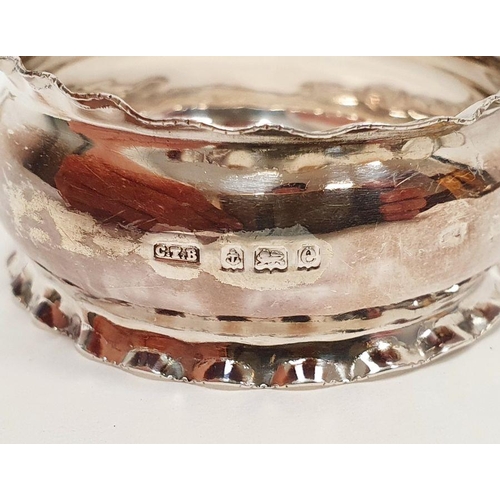 352 - Three silver-rimmed cut glass personal salts and six various silver napkin rings