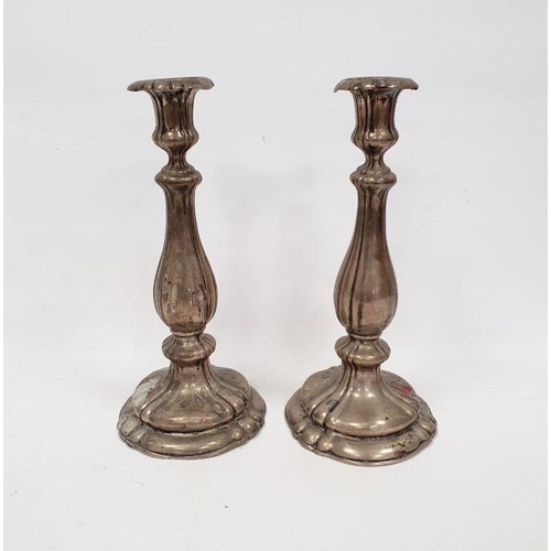 371 - Pair of early 20th century silver-coloured metal, possibly German candlestick holders, marks worn, e... 