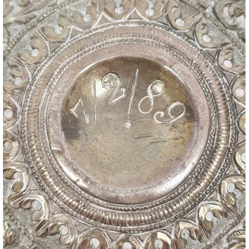 377 - Silver-coloured metal foliate repousse circular bowl, marked '7/2/89' to base, 10cm diameter approx.... 